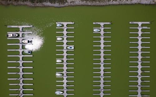 (Francisco Kjolseth | The Salt Lake Tribune) Boats begin to reappear in the Great Salt Lake Marina on Thursday, May 18, 2023, as the saline lake sees some recovery, rising over 4 feet following a record breaking snowpack year.